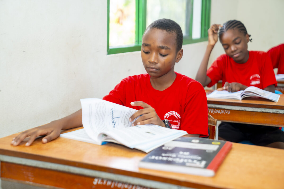 DSC03307-1200x800 Student at St. Thomas School engaged in self-study, reflecting the school’s emphasis on academic discipline.